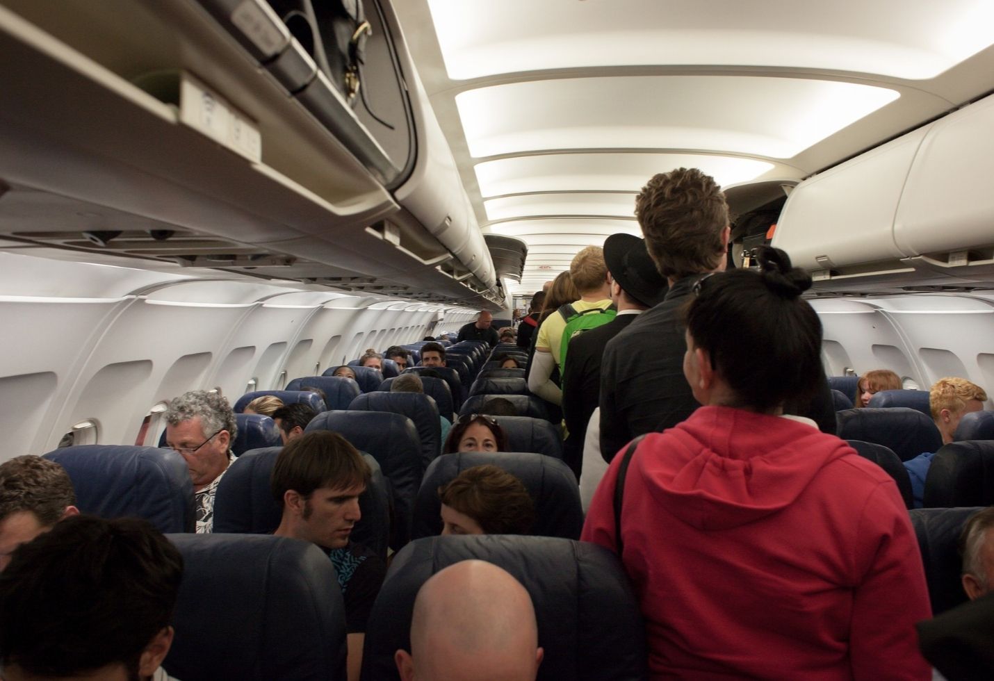 The One Thing That Will Keep Your Kids Occupied on a Plane, According to Traveling Parents
