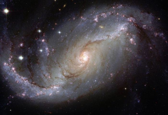 Something very big and very dark punched a hole in our galaxy