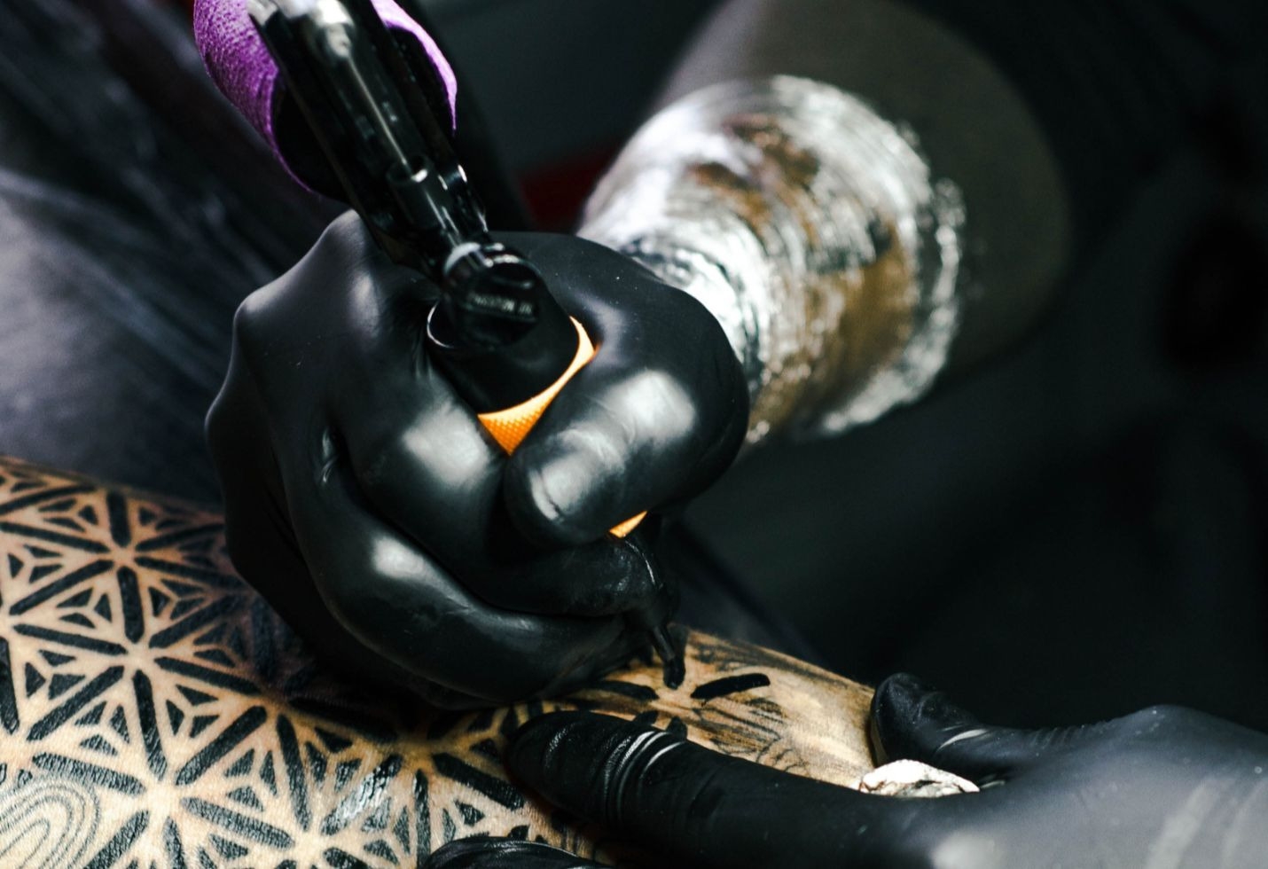 Tattoo artist sees bump in desire to erase hateful skin art