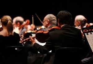 Tattooed, Mexican-American and female: Classical maestra keeps symphony in tune